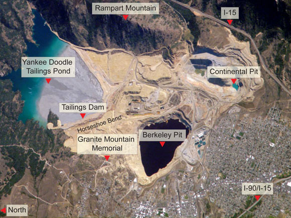 This 2002 photo from the NASA Earth Observatory shows the Berkeley Pit and surrounding area prior to the construction of the Horseshoe Bend Water Treatment Plant and the resumption of mining at the Continental Pit.